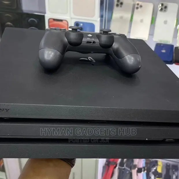 Super Neat Uk Used Ps4 Pro With Original Accessories