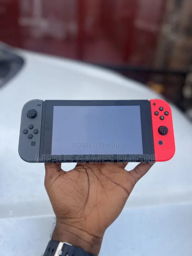 Nintendo Switch + Games Installed Both Fc26,Mk, Car Race Others