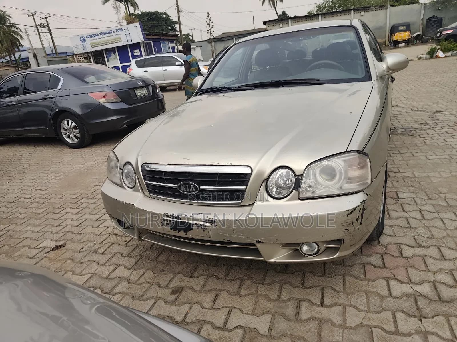 2004 Kia Optima EX Sedan FWD (2.4L 4cyl 4A)