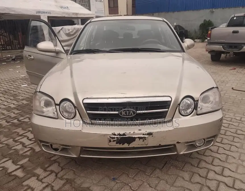 2004 Kia Optima EX Sedan FWD (2.4L 4cyl 4A)